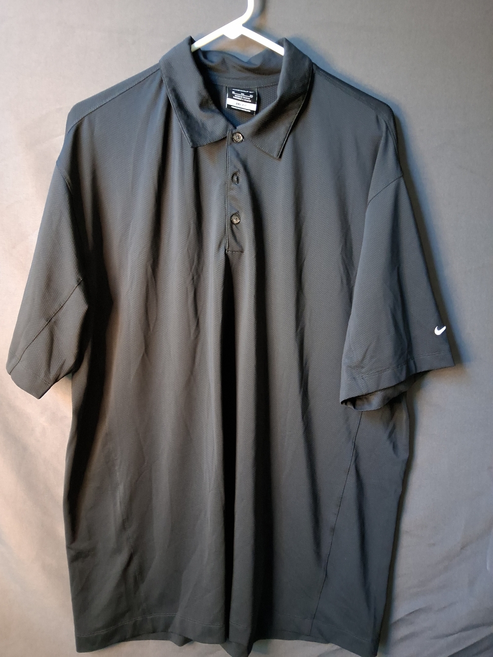 Nike Men’s Black Polo with White Swoosh